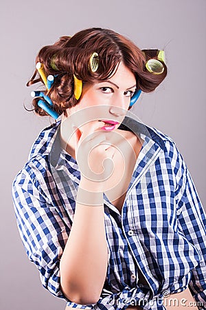 Sexy housewife with curlers