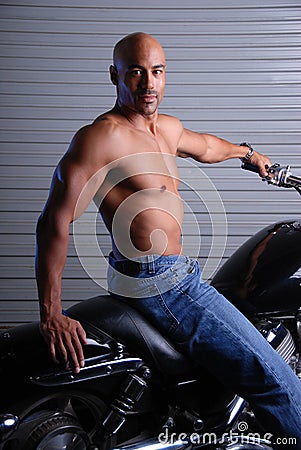 Sexy man on motor cycle.