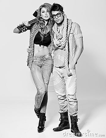 Sexy man and woman doing a fashion photo shoot