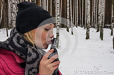Sexy russian woman kisses her mobile phone