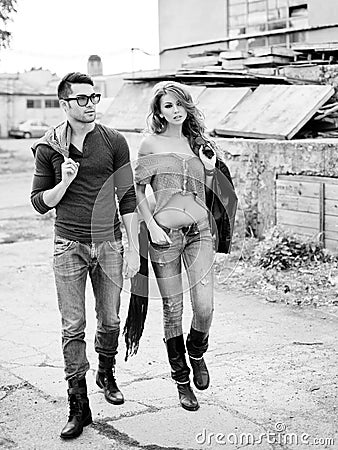 Sexy and stylish young couple wearing jeans