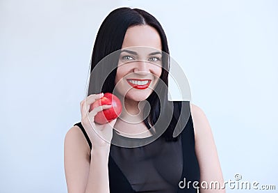 Sexy woman in black with red apple