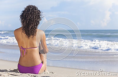 Sexy Woman Girl Sitting in Bikini on Beach