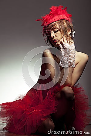 Sexy woman in red hat with net veil