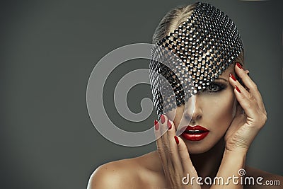 Sexy woman with red lips and metal decor