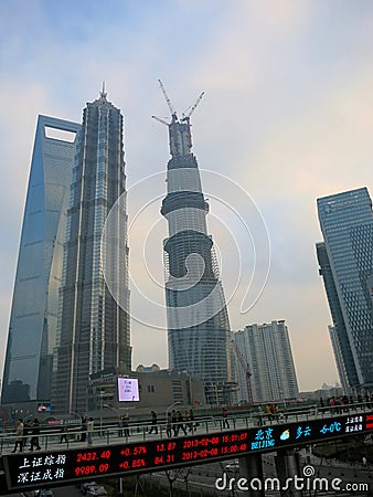 Shanghai Financial District -- the tallest buildings of Shanghai s Lujiazui financial district with the stock ticker in front