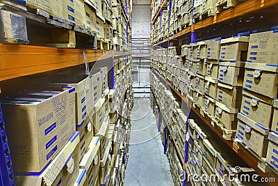 Shelf racks with boxes in storage warehouse, the interior space.