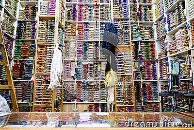Shelves of colorful cotton reels in Tangier, Morocco