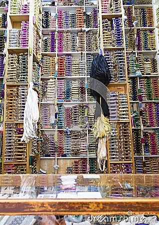 Shelves of colorful cotton reels in Tangier, Morocco