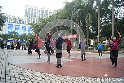 Shenzhen, China: citizens in jump square dance