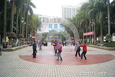 Shenzhen, China: citizens in jump square dance