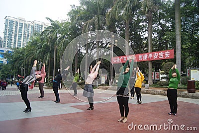 Shenzhen, China: citizens in jump square dance