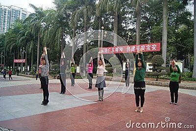 Shenzhen, China: citizens in jump square dance