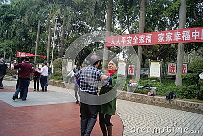 Shenzhen, China: citizens in jump square dance