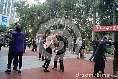 Shenzhen, China: citizens in jump square dance