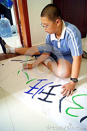 Shenzhen china: primary and secondary school students in writing