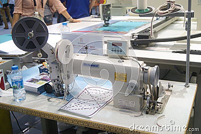 Shenzhen, China: sewing machine and weaving machine