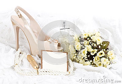 Shoes, lace and wedding rings with banner add