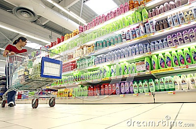 Shopping for shampoo at supermarket