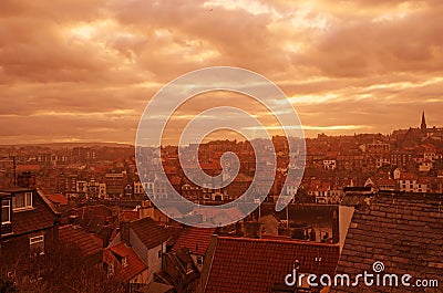 A shot over the roof tops at Whitby harbor in the