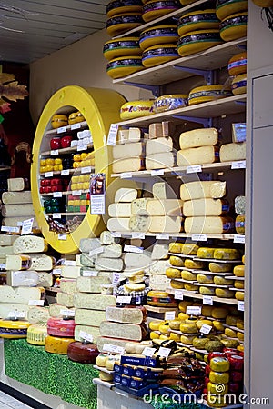 Show-window with cheese in shop