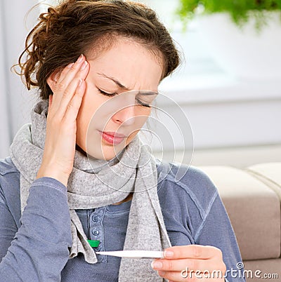Sick Woman with Thermometer