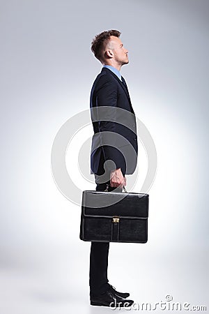 Side of business man with briefcase