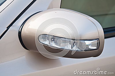 Side mirror with turn signal of a car