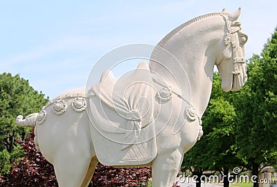 Side View of a stone war horse statue in full show regalia.