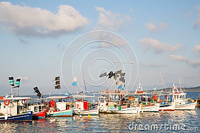 Sightseeing in Greece: traditional fishing boats on the greek is