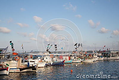 Sightseeing in Greece: traditional fishing boats on the greek is