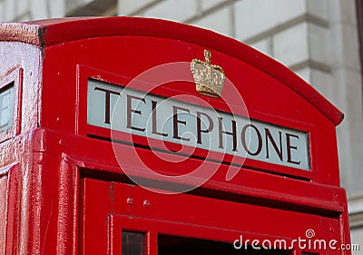 Sign on Red Telephone Booth