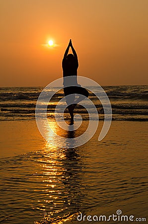 Silhouette of a beautiful Yoga man
