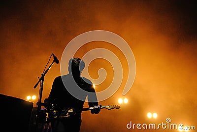 Silhouette of Ben Gibbard, vocalist and guitarist of The Postal Service band