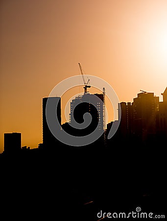 Silhouette of building construction