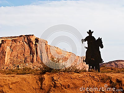 Silhouette of cowboy on horse in Monument Valley