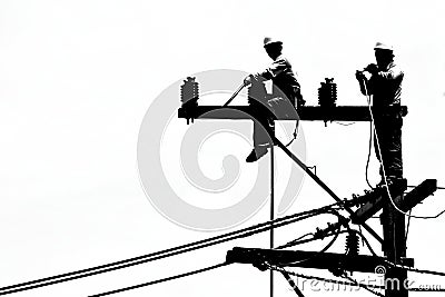 Silhouette electrician working on electricity post