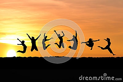 Silhouette of friends jumping