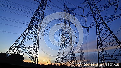 Silhouette of high power transmission towers.