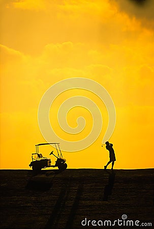Silhouette of a man during a golf swing