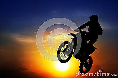 Silhouette of a motorcyclist