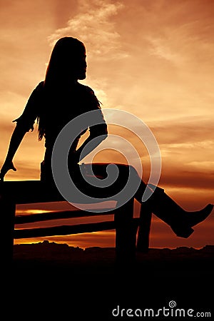 Silhouette sunset woman sitting