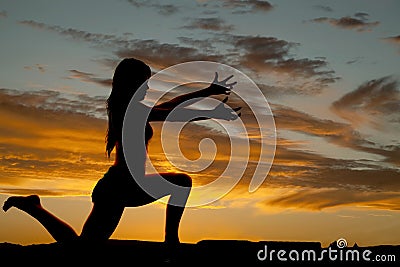 Silhouette woman knee reach out