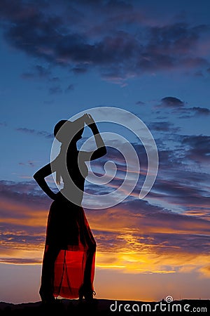 Silhouette woman see through skirt hand hat
