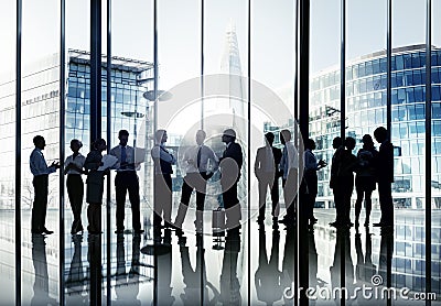 Silhouettes of Business People Working and Cityscape