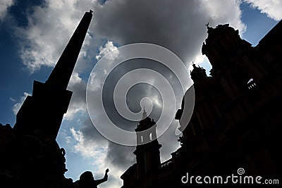 Silhouettes of obelisk, fountain and church. Piazz