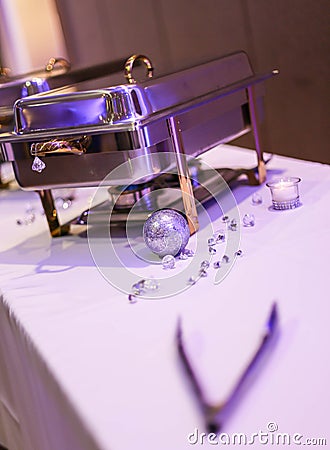 Silver and gold chafer at wedding reception