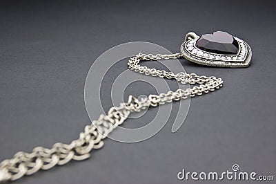 Silver necklace with heart-shaped pendant