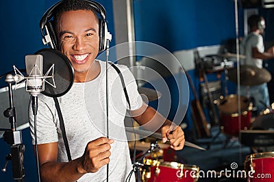 Singer recording his new track in studio