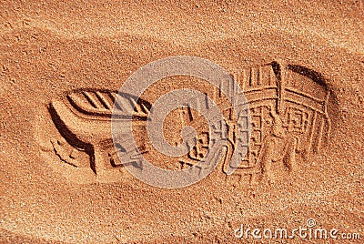 Single shoe print in sand